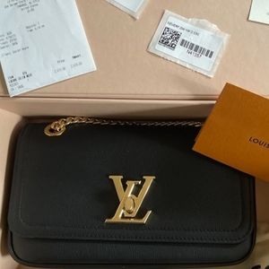 Louis Vuitton Lock me chain bag East West